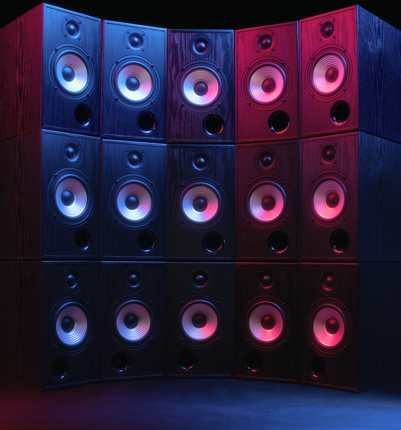 Group of sound speakers in neon light